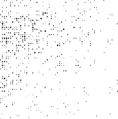 A scattered arrangement of numerous dark dots on a white background.
