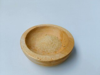 Brown Sugar in Wooden Bowl Still Life on White