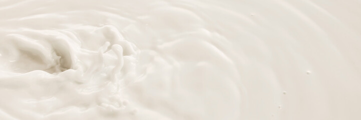 White milk swirls in soft circular motion with textured surface and natural flow. Concept of drink, organic food, aesthetics, advertisement. Banner