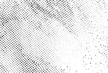 A dense textured of small black dots against a white background.