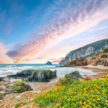 Attractive view of beach Portu Cauli in Masua with Pan di Zucchero at background.