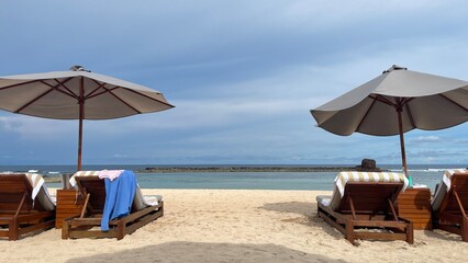 beach chairs and umbrella on the beach