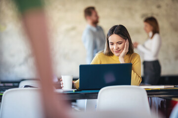 Young software developers in coworking open space