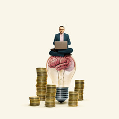 Man sitting on giant lightbulb with laptop among stacks of coins - innovation and financial success...