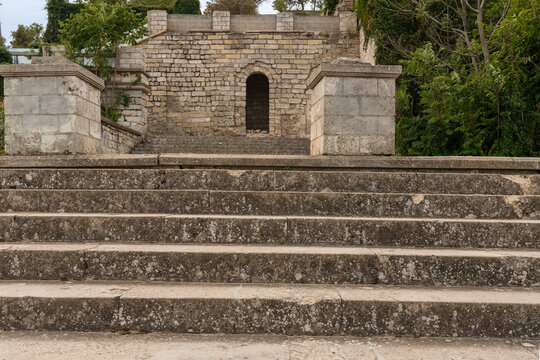 Mithridates Staircase in Kerch. Ancient stone steps lead to the top of Mount Mithridates, demonstrating historical architecture in the midst of nature.