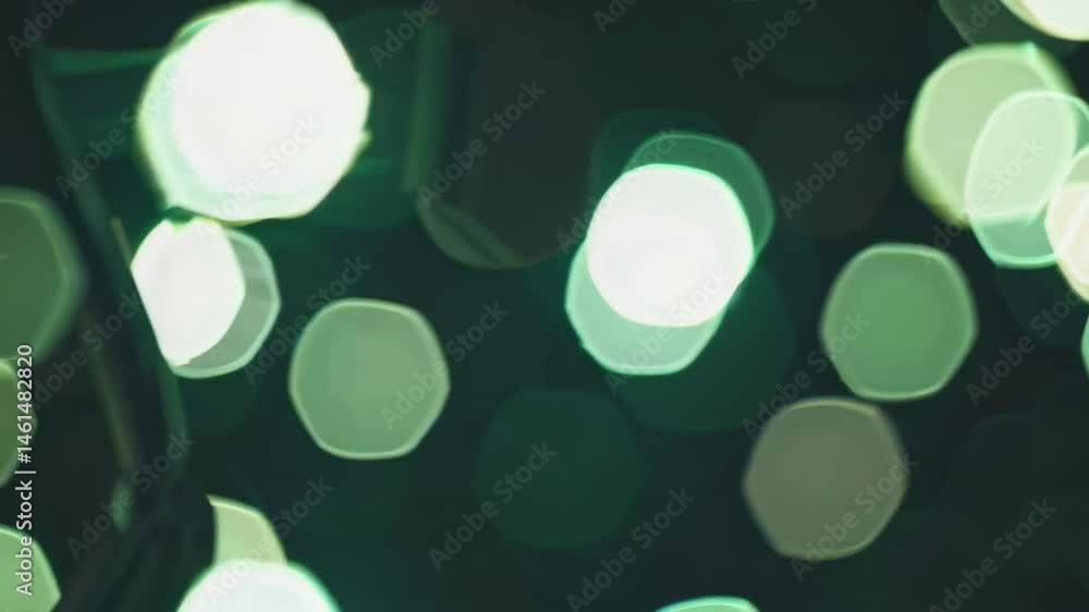 Poster dreamy green bokeh background transitioning in gentle motion