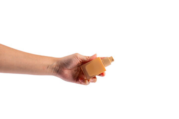 Cosmetic cream tube in womans hand on transparent background