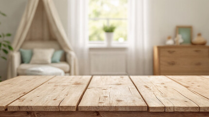 Empty wooden table with blurred  baby room background, for design and decoration concepts