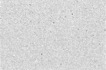 Fototapeta premium A textured gray surface displays a dense of small dots.