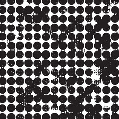 Fototapeta premium A dense arrangement of black and white circles dominates the