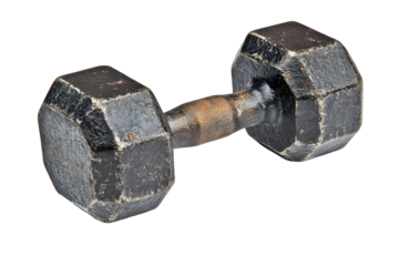 Worn, black iron dumbbell, octagonal weights, isolated on a black background.  The metal is dark, showing signs of use and age.  A simple, strong weight for strength training