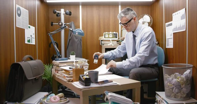 Bored office worker doing a repetitive task