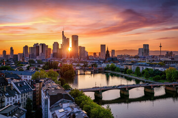 Panoramic view of the city skyline of Frankfurt am Main, Germany, during a beautiful summer sunset with colorful sky