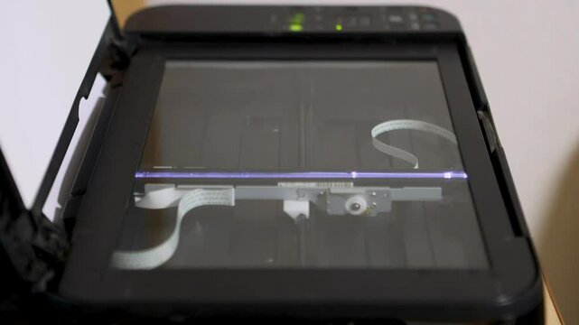 The scanning head of the office scanner performs the scanning process