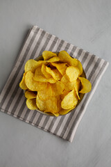 Homemade Kettle Cooked Potato Chips with Salt in a Bowl, top view.