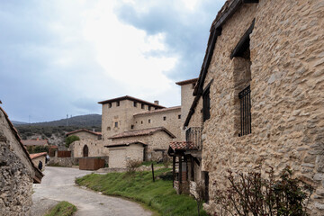 Fototapeta premium Picturesque stone houses form charming medieval village in the spanish countryside