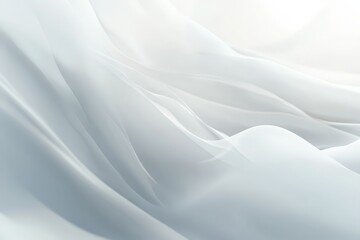 Fototapeta premium Soft, flowing white fabric folds in light.