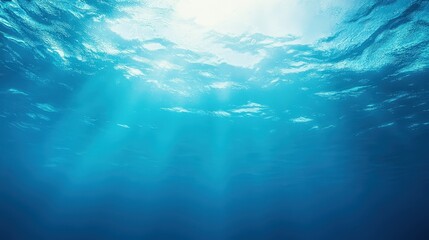 A tropical ocean-inspired blue gradient background shifting from deep sea blue to crystal-clear aqua