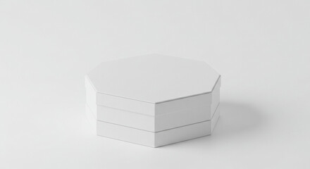 Empty white octagonal box resting on a white surface. Modern geometric packaging design for product presentation. Blank packaging for mockup, design and branding. studio.