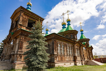 Holy Trinity Cathedral in Karakol city, Kyrgyzstan. Wooden church, architecture. Kyrgyzstan Diocese...