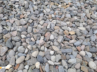 Gravel texture or gravel background for design. Real grunge texture background and small stone.Top view of ground gravel road. selective focus.	
