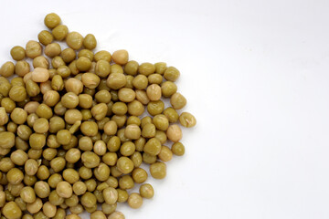 Canned green peas on white background.