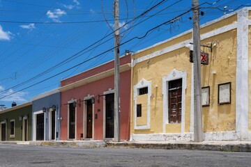 Row of colorful colonial houses in street in Mexican town  © Francisco