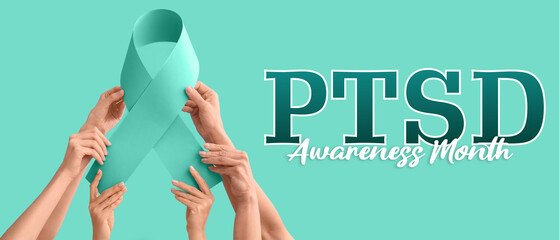 Hands holding paper awareness ribbon on lilac background