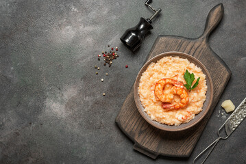 Risotto with seafood on a dark background