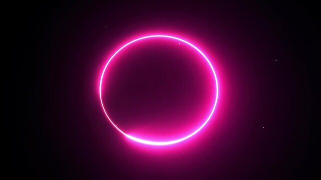 Glowing pink circle on black background
