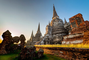 Fototapeta premium Ayutthaya Temple ruins at sunset,within the ancient Royal Palace complex,Thailand.