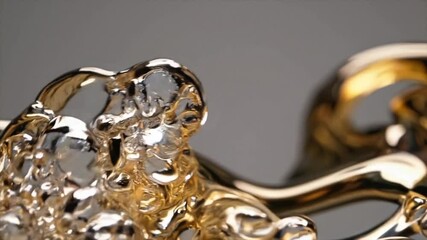Exploring the intricate movement of golden liquid in a close-up demonstration of fluid dynamics