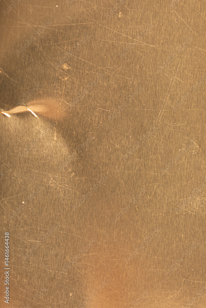 Poster High-resolution image of a scratched gold metal texture. Perfect for backgrounds and design projects.