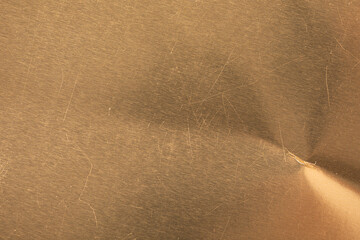 High-resolution image of a scratched gold metal texture. Perfect for backgrounds and design...