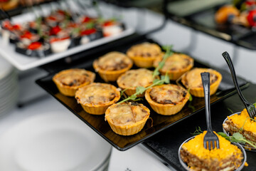 Catering plate. Assortment of snacks on the buffet table 