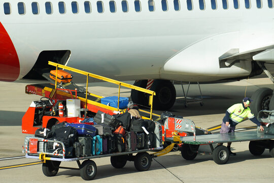 Loading baggage onto airplane