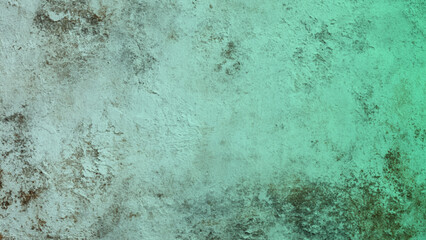 A close up of a green wall with a fluid aqua pattern resembling liquid art.A close up of a green wall with a fluid aqua pattern resembling liquid art. Striped Teal Mint Green Ombre Grunge Texture Back