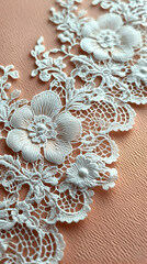 Delicate white lace trim with embroidered flowers