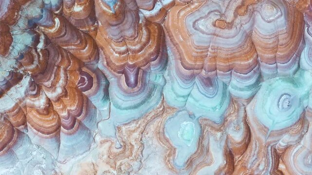 Cinematic aerial shot of abstract patterns of desert landscape in Hanksville, Utah, USA