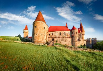Majestic summer view of Hunyad Castle (Corvin's Castle). Amazing summer cityscape of Hunedoara...
