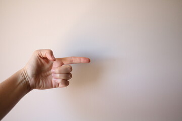 hand points to background