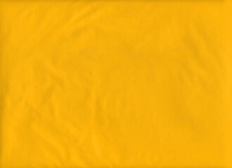 Yellow plastic texture as abstract background, wallpaper, sticker, poster, placard, billboard.
