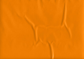 Orange crumpled plastic texture for abstract background, wallpaper, sticker, poster, placard,...