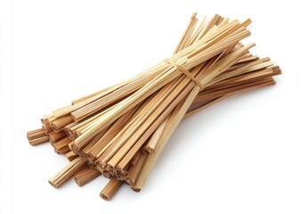 A bundle of light brown, thin wooden sticks, tightly clustered together and tied with a light-colored string.  The sticks are various lengths, and appear to be cut or broken at an angle