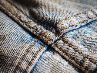 Close-up of details of the surface of denim fabric, Blue denim jeans background