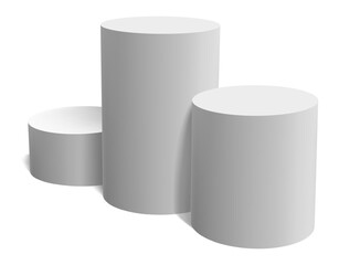 Three empty white cylindrical podiums of different heights standing on a white background representing a winners' platform for celebrating achieving goals