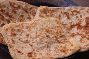 A close-up of the traditional Moroccan flatbread known as msemmen or msemen