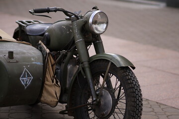 Detail of an old military motorcycle used in the Second World War. Military equipment.