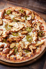 Gyros Pizza with jalapeno pepper and mozzarella cheese. Soft focus. Close up.	