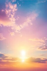 Colorful sunset sky with soft clouds.  A vibrant mix of oranges, pinks, and blues fills the sky.  A setting sun is visible near the horizon